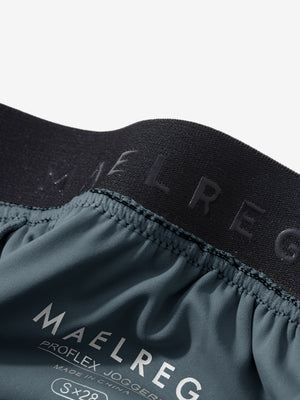 Inside view of waistband on grey blue women's lightweight athletic sweatpants