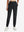 Front lower body shot of model wearing black women's lightweight athletic sweatpants