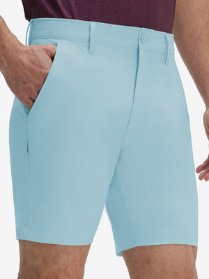Front lower body shot of model wearing light blue flat front hybrid golf shorts
