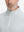 Close-up of collar area on jacquard quarter zip pullover in light grey, highlighting refined jacquard detail.