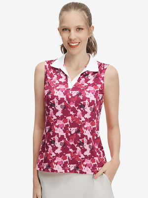 Front upper body shot of model wearing red splatter women's sleeveless v-neck print golf shirt