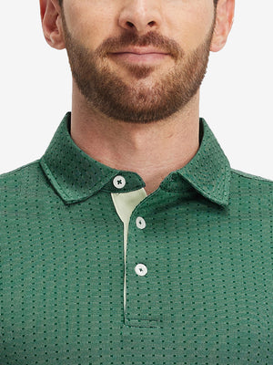Front shot from nose to chest of model wearing green classic lightweight jacquard golf shirts