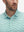 Front view from nose to chest of model wearing the green lucky clover 4 way stretch print collared polo shirt, showcasing the upper fit