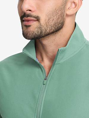 Front view from nose to chest of model wearing green grey waffle texture 1/4 zip pullover
