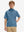 Front waist-up shot of model wearing grey blue water-resistant short sleeve q-zip hoodie for boys
