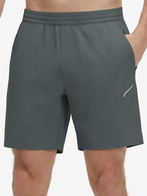 Front lower body shot of model wearing dark grey 4 way stretch breathable workout athletic shorts