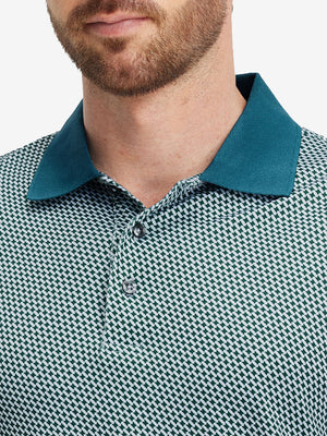 Front view from nose to chest of model wearing dark green oval premium ribbed collar print polo shirts