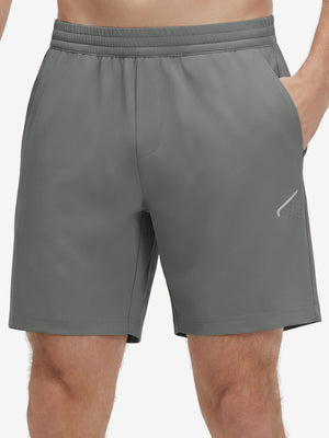 Front lower body shot of model wearing iron grey 4 way stretch breathable workout athletic shorts