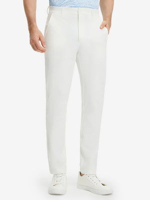 Front lower body shot of model wearing white stretch cotton blend slim fit golf trousers 5 pockets