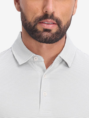 Front view from nose to chest of model wearing light grey white comfy breathable pin-stripe texture golf polos