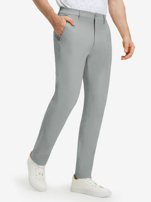 Front lower body shot of model wearing rose dust stretch cotton blend slim fit golf trousers 5 pockets