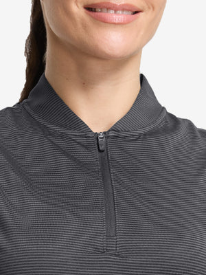 Front shot from nose to chest of model wearing light and dark grey women's q-zip pin striped texture golf shirts