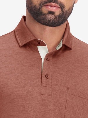 Front view from nose to chest in red ochre heather of performance heather contrast collar polo shirts.