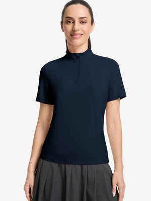 Front upper body shot of model wearing navy women's breathable 1/4 zip pullover golf shirts