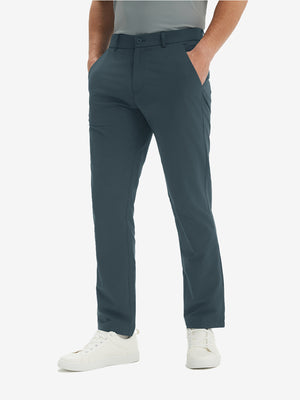 Front lower-body view of model in grey blue stretch quick dry casual golf pants with 4 pockets