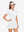 Front upper body view in white of women's lightweight golf dress with 2 pockets.
