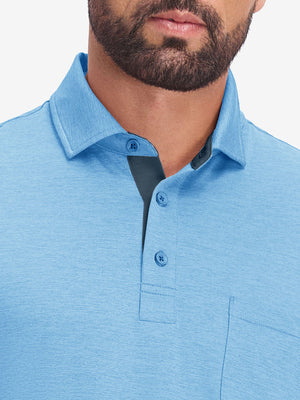 Front view from nose to chest in blue heather of performance heather contrast collar polo shirts.