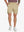 Front lower-body view of model wearing KHAKI Water Resistant Versatile 8 Pockets Shorts.