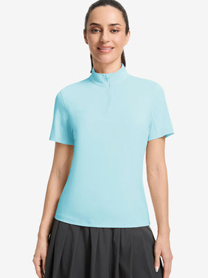 Front upper body shot of model wearing light blue women's breathable 1/4 zip pullover golf shirts