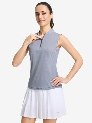 Front upper body shot of model wearing navy white women's q-zip pin striped texture golf shirts