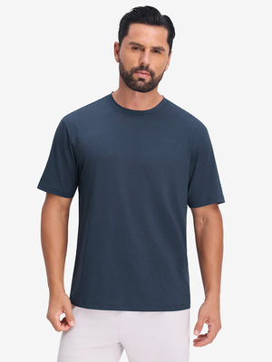Front upper body view in dark blue heather of moisture wicking heather round neck athletic t-shirts.