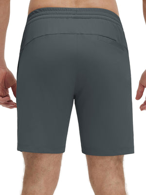 Back lower body shot of model wearing dark grey 4 way stretch breathable workout athletic shorts