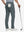 Back lower body shot of model wearing iron grey straight fit lightweight dress golf pants
