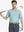 MAELREG Men's Performance Jersey Print Polo in Green White Fish – front half-body with golf pose