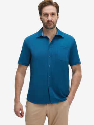 Front upper body shot of model wearing blue cool print plain button up shirts