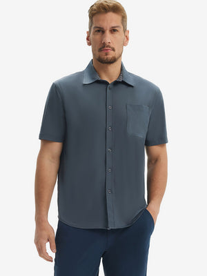 Front upper body shot of model wearing dark grey cool print plain button up shirts