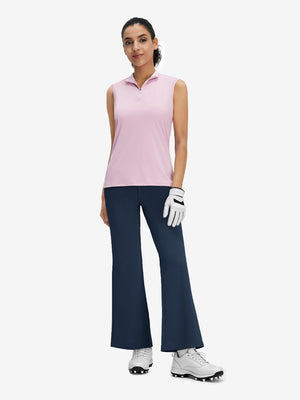 Front full body shot of model wearing navy women's high waist stretch golf pants with pockets