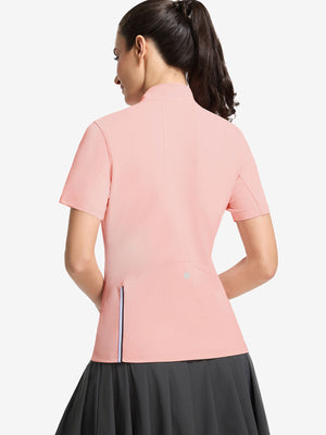 Back upper body shot of model wearing coral powder women's breathable 1/4 zip pullover golf shirts