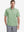 Model half-body front view wearing light green cotton blend plain shirt.