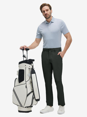 Front full body shot of model wearing dark charcoal straight fit lightweight dress golf pants