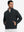 Model with both hands in pockets, wearing soft winter fleece jackets in black, warm and relaxed.