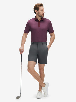 Front full body shot of model wearing iron grey flat front hybrid golf shorts