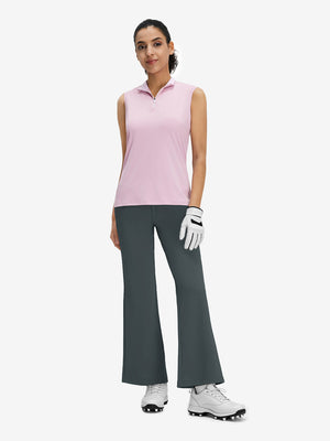 Front full body shot of model wearing dark grey women's high waist stretch golf pants with pockets