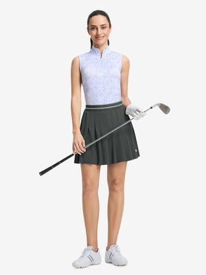 Front full body shot of model with golf gear wearing dark grey women's moisture-wicking athletic tennis skirts