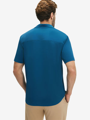 Back upper body shot of model wearing blue cool print plain button up shirts