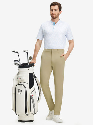 Front full body shot of model wearing khaki stretch cotton blend slim fit golf trousers 5 pockets
