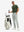 Full front view: model in light grey stretch quick dry casual golf pants with 4 pockets taking club from golf bag.