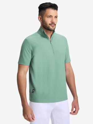 Front upper body shot of model wearing green grey waffle texture 1/4 zip pullover