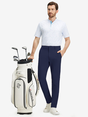 Front full body shot of model wearing dark blue stretch cotton blend slim fit golf trousers 5 pockets