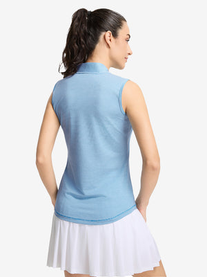 Back upper body shot of model wearing blue white women's q-zip pin striped texture golf shirts