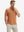 Front half body shot of model wearing orange adobe reflective performance reflective checked collar golf shirt