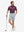 Front full body shot of model wearing newport blue flat front hybrid golf shorts