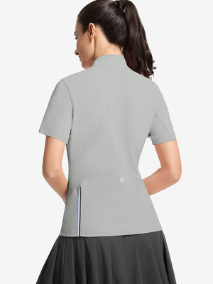 Back upper body shot of model wearing light grey women's breathable 1/4 zip pullover golf shirts