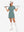 Front full body with golf club in dusty blue of women's lightweight golf dress with 2 pockets.