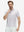 Front half-body shot of model wearing the white polka dots 4 way stretch print collared polo shirt for a casual sporty look