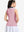 Back upper body shot of model wearing lavender women's collared v neck quick dry tank tops